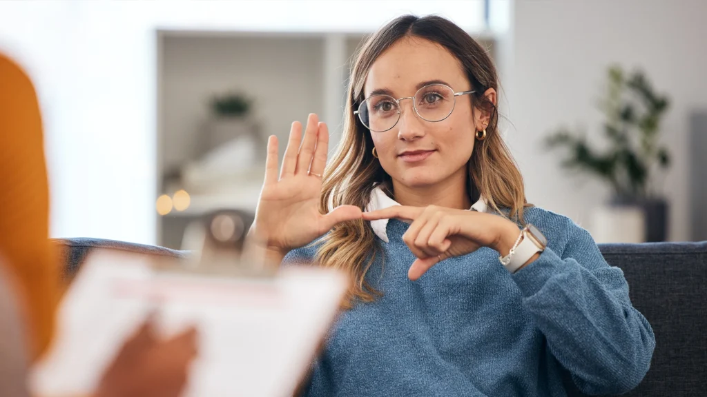 PN Inclusion - Making communication accessible for everyone, everywhere - Professional Deaf Relay Services Image of Lady Signing